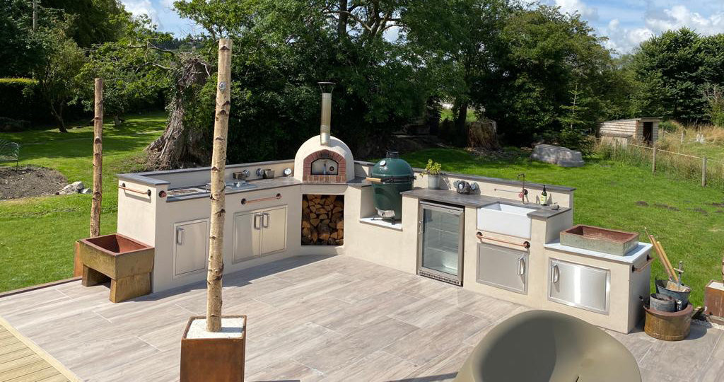 Custom built L shaped outdoor kitchen