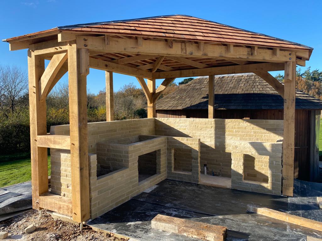 outdoor kitchen with tiled roof