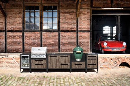 Burnout outdoor kitchen in dark oak and powder coated frames.