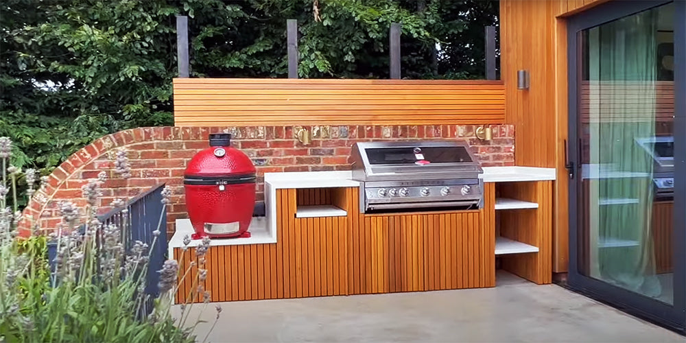 outdoor kitchen made with ceramic worktops and cedar cladding